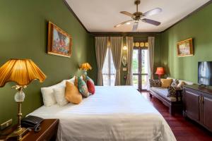 Giường trong phòng chung tại Puripunn Hideaway +76 ảnh