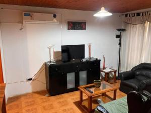 TV a/nebo společenská místnost v ubytování Casa quinta El Descanso