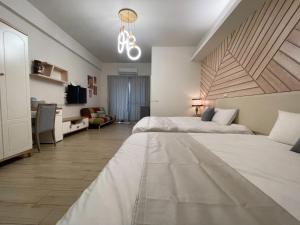 Voodi või voodid majutusasutuse 屏東潮州民宿-綠品文旅Green Inn toas