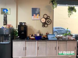 Köök või kööginurk majutusasutuses 屏東潮州民宿-綠品文旅Green Inn