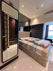 Легло или легла в стая в Cozy Apartment on Top of Pakuwon City Mall