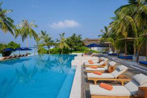 a pool at the resort at Emerald Faarufushi Resort & Spa - Deluxe All Inclusive in Raa Atoll