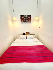 Voodi või voodid majutusasutuse seVilla Guest House Pasuruan toas