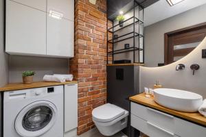 Kúpeľňa v ubytovaní Near EXPO Cracow Elegant Apartment by Noclegi Renters