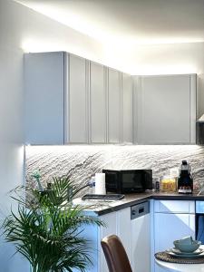 Nhà bếp/bếp nhỏ tại Mons - superbe appartement 2CH - parking free