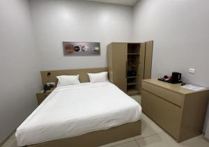 金沙萨Ixoras Hotel Victoire的相册照片