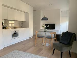 Cuisine ou kitchenette dans l'établissement Bob W Koti Ullanlinna