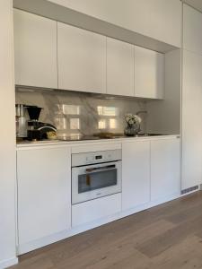 Cuisine ou kitchenette dans l'établissement Bob W Koti Ullanlinna