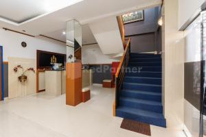 TV o dispositivi per l'intrattenimento presso Ian Hotel Jaksa Mitra RedDoorz