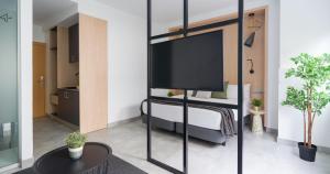 TV a/nebo společenská místnost v ubytování Tusity One + 63 fotografií