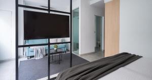 TV a/nebo společenská místnost v ubytování Tusity One