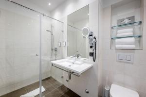 Kylpyhuone majoituspaikassa IMLAUER Hotel Nestroy Wien