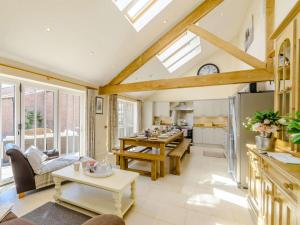 a kitchen and living room with skylights at 5 Bed in Thirsk 40349 in Carthorpe +16 photos