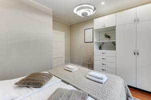Posteľ alebo postele v izbe v ubytovaní Nadmorski Park Comfort Apartments