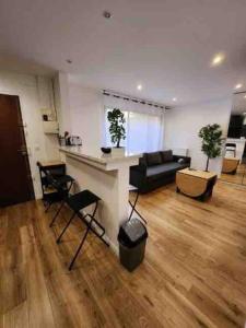 Posezení v ubytování Superbe appartement à 8 minutes de la nation.