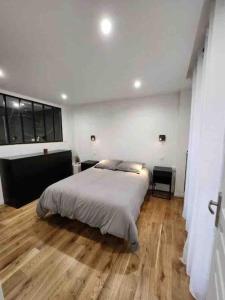 Postel nebo postele na pokoji v ubytování Superbe appartement à 8 minutes de la nation.