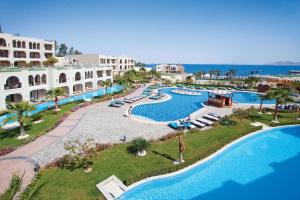 an aerial view of a resort with two pools at Sunrise Arabian Beach Resort in Sharm El Sheikh