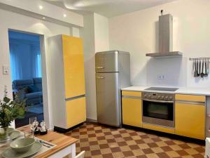 Kjøkken eller kjøkkenkrok på Gemütliche Altbauwohnung in RT-Betzingen