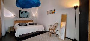 Postel nebo postele na pokoji v ubytování b&b Het Wolfshuis