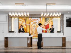 Lobbyn eller receptionsområdet på Vienna International Hotel Xiamen Tong'an Industrial Concentration Area