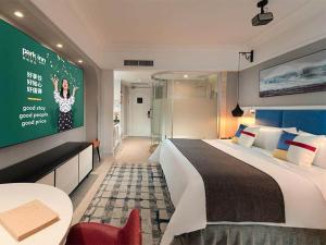 Afbeelding uit fotogalerij van Park Inn by Radisson Beihai Silver Beach Wanda Plaza in Beihai +56 foto's