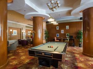 a billiard room with a pool table in it at Park Inn by Radisson Shanghai Downtown in Shanghai