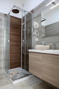 a bathroom with a shower and a sink at VILLA MARTINA PIA B&B in Filiano