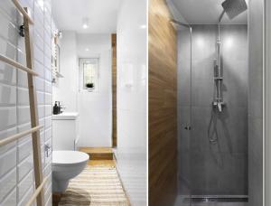 a bathroom with a toilet and a shower at Elite Apartments Cozy Studio Sopot in Sopot