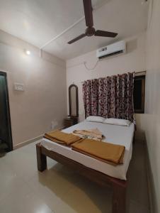 Letto o letti in una camera di Konkan Villa Dream