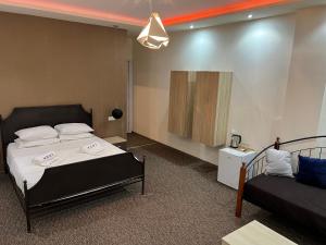 KENT hotel & Restaurant KENT beach客房内的一张或多张床位