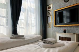 Postel nebo postele na pokoji v ubytování Hotel Kleiner Riesen