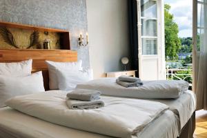 Postel nebo postele na pokoji v ubytování Hotel Kleiner Riesen