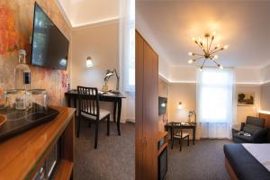 Zimmer mit Küche und Wohnzimmer in der Unterkunft Hotel Kleiner Riesen in Koblenz