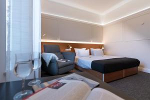 Postel nebo postele na pokoji v ubytování Hotel Kleiner Riesen
