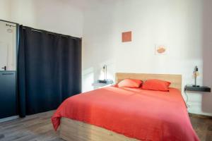Llit o llits en una habitació de Appartement vue mer à la frontière de Monaco