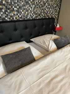Posteľ alebo postele v izbe v ubytovaní Padre Boutique Hotel