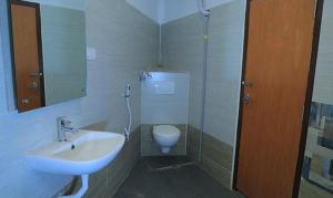A bathroom at FabHotel Octagon Beach Resort
