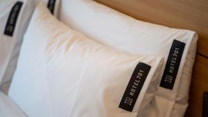 Postel nebo postele na pokoji v ubytování Hotel 701 Gyeongju