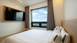 TV a/nebo společenská místnost v ubytování Hotel 701 Gyeongju