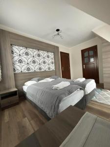 Ένα ή περισσότερα κρεβάτια σε δωμάτιο στο Willa u Bacy