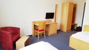 TV a/nebo společenská místnost v ubytování G&K Hotel