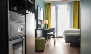 Postel nebo postele na pokoji v ubytování Thon Hotel Snø