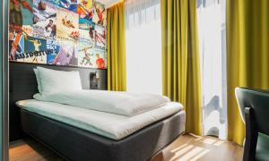 Postel nebo postele na pokoji v ubytování Thon Hotel Snø