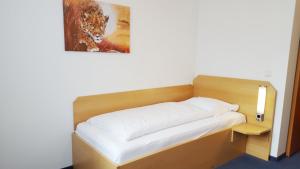 Postel nebo postele na pokoji v ubytování G&K Hotel