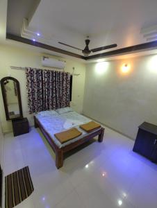 Letto o letti in una camera di Konkan Villa Dream