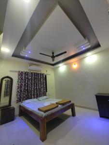 Letto o letti in una camera di Konkan Villa Dream