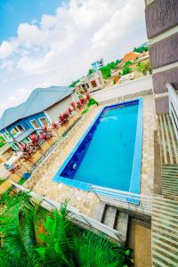 an image of a swimming pool at a villa at The Palaixon in Bujumbura