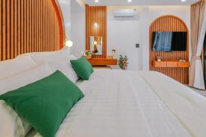 Postel nebo postele na pokoji v ubytování Pangthara65 ปางธารา ณ ปางไฮ เชียงใหม่