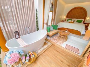 Postel nebo postele na pokoji v ubytování Pangthara65 ปางธารา ณ ปางไฮ เชียงใหม่
