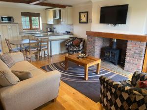 A seating area at Red House Farm Cottages